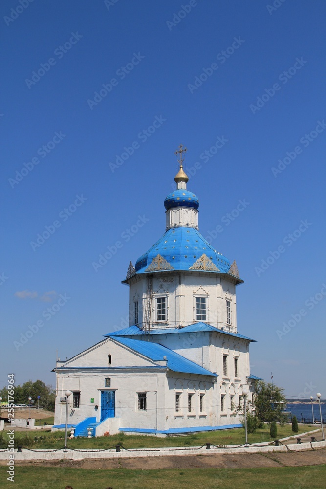 summer landscape with a view of the Assumption Church