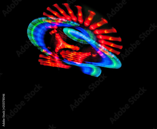 black background and light abstract patterns rainbow colorful, copy space, menu, freezelight drawing colored light