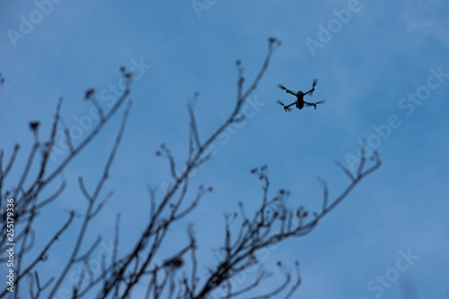 drone flying in blue sky