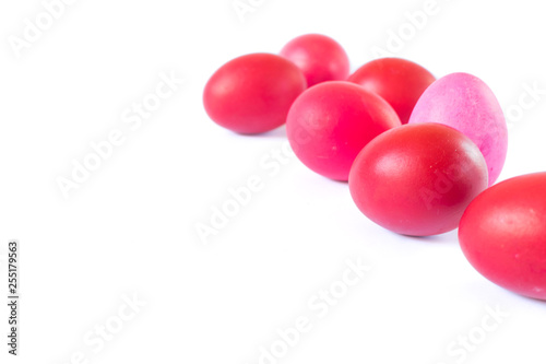 Red and pink easter eggs isolated on white background © rastkobelic