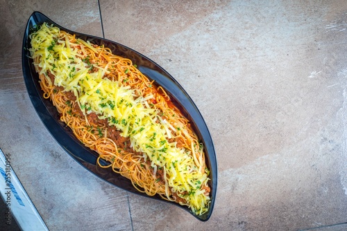 Tasty appetising classic i spaghetti pasta with tomato sauce, cheesey