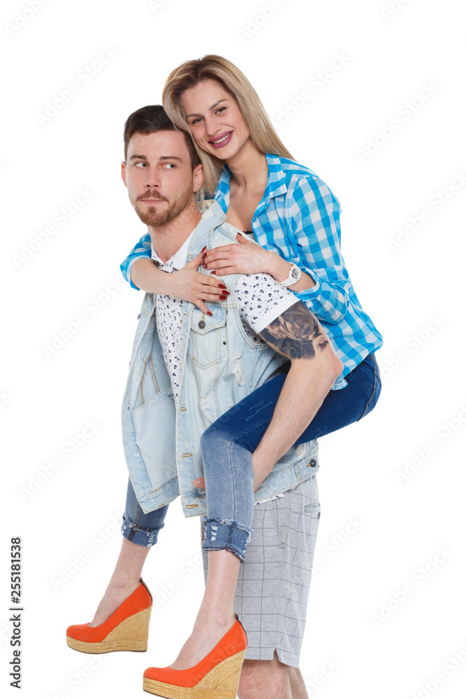 Front view of a stylish couple. beautiful friendly girl and guy together. Front view of a stylish couple. beautiful friendly girl and guy together.