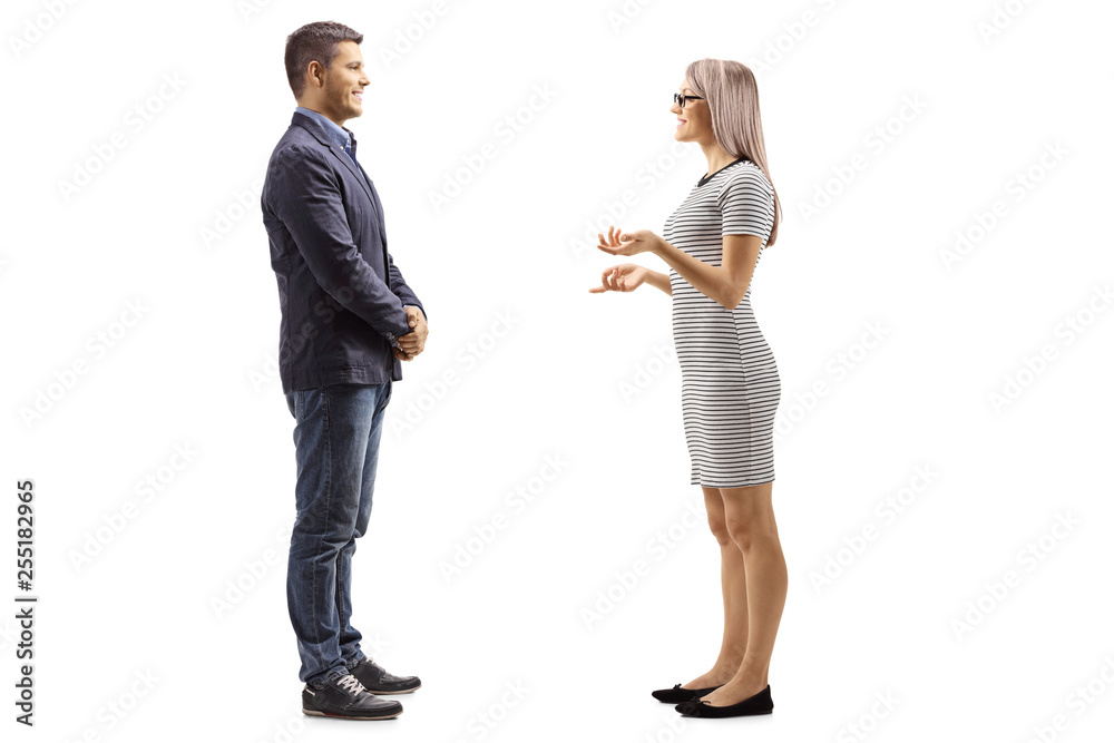 Young man and woman standing and having a conversation Young man and woman standing and having a conversation