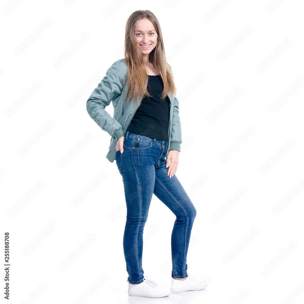 Woman in jeans and green jacket walking goes smiling on white background isolation Woman in jeans and green jacket walking goes smiling on white background isolation