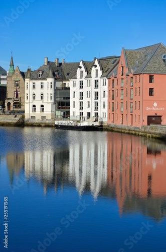Another stunning water reflection of the Art Nouveau architecture over a water canal of Alesund, Norway.