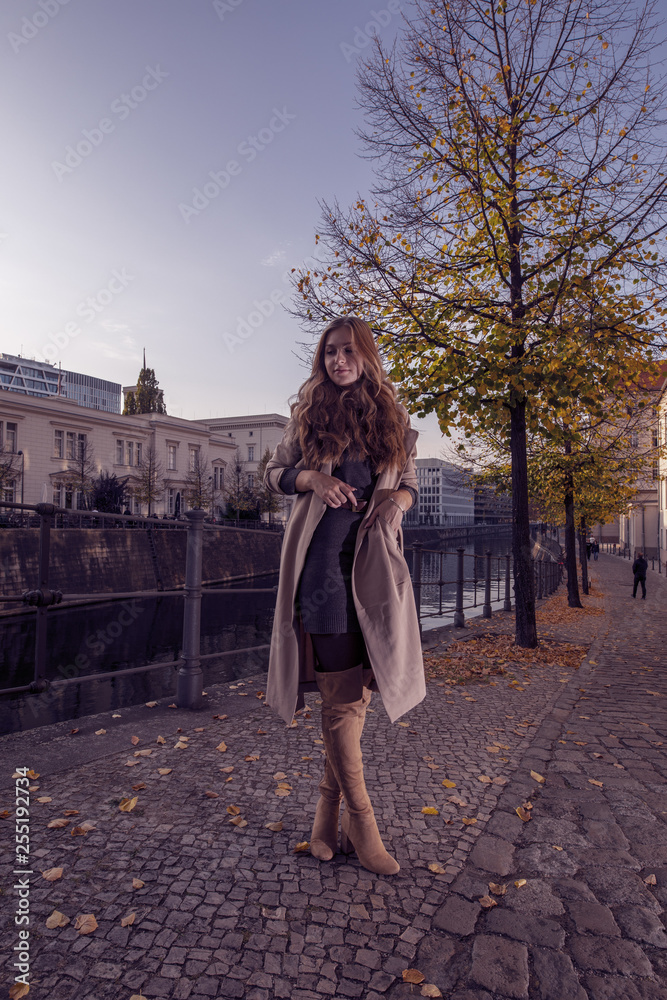 young woman in nice dress around berlin 