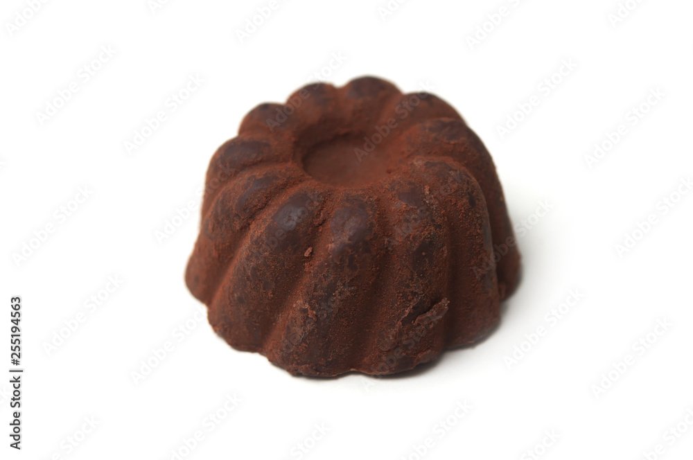 Closeup of chocolate truffle in shaped Kougelhopf on white background Closeup of chocolate truffle in shaped Kougelhopf on white background