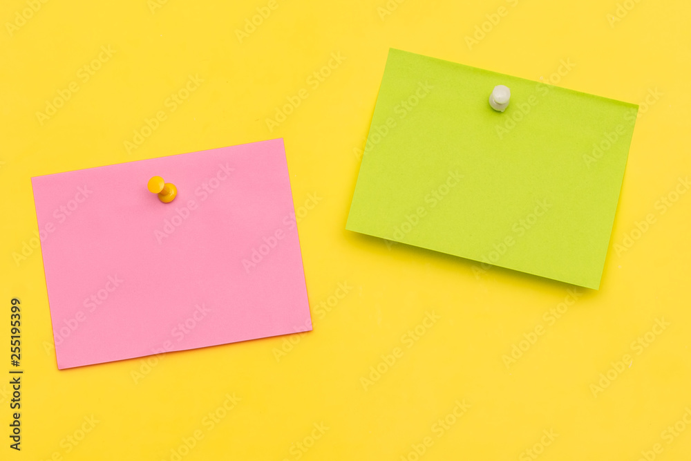 The trend of creativity. Colored paper notes pinned on a yellow background. The trend of creativity. Colored paper notes pinned on a yellow background.