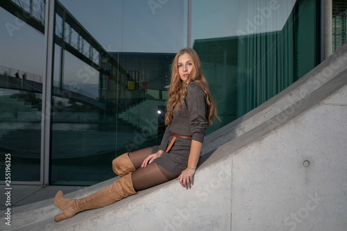 young woman in nice dress around berlin 