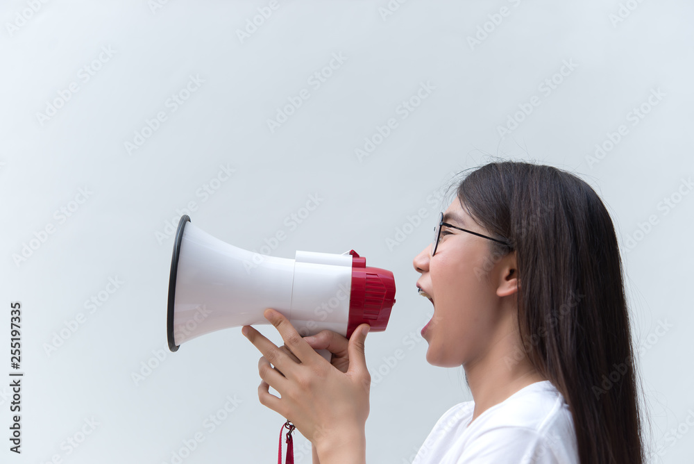 Beautiful asian woman with speaker in hand on white background,angry woman concept,Thailand people Beautiful asian woman with speaker in hand on white background,angry woman concept,Thailand people