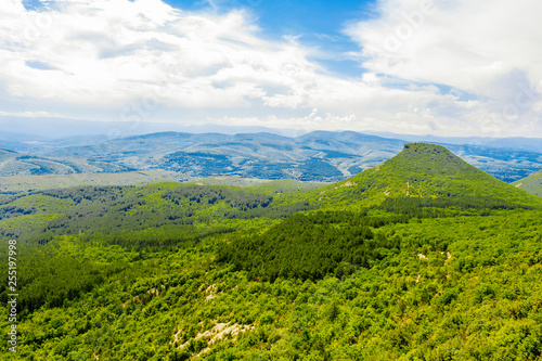 landscape of mountains and valleys of the Crimean Peninsula overlooking the mountain resembling a pyramid