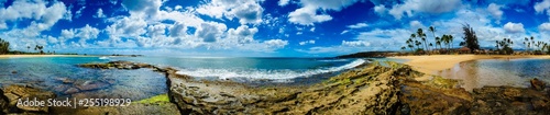 Pano of beach with 3 pools