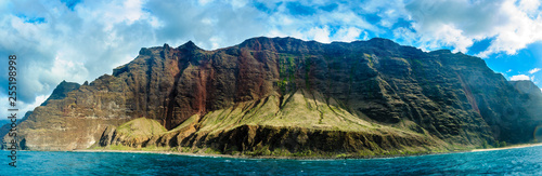 NaPali Mountian from ocean with lighted clift photo