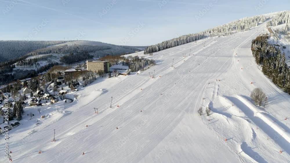 Aerial Fichtelberg winter sports area Drone flies over stunning European winter landscape Aerial Fichtelberg winter sports area Drone flies over stunning European winter landscape