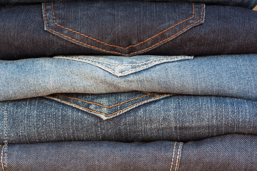 Jeans stack, Background fashion jeans. Jeans stack, Background fashion jeans.
