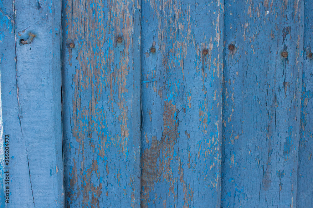 boards nailed painted blue