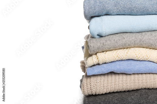 knitted sweaters on a white background
