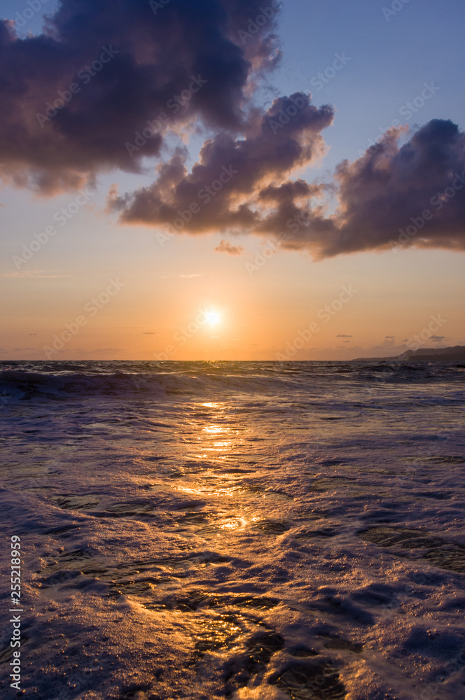 Amazing sea sunset, the sun, waves, clouds