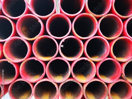 stacked iron pipes