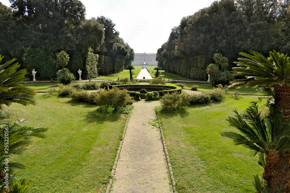 Reggia di Caserta, Italy. 10/27/2018. Royal Palace Park. The design of a circular pool surrounded by a green lawn.
