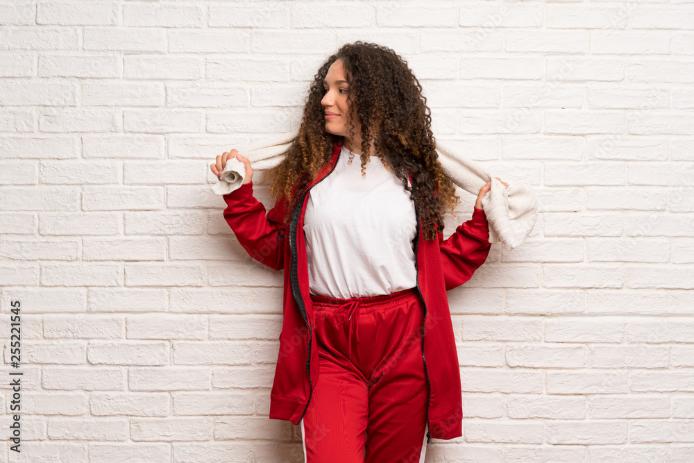 Teenager sport girl with curly hair Teenager sport girl with curly hair
