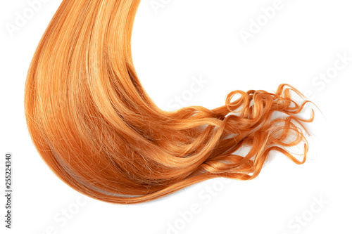 Long wavy red hair isolated on white background