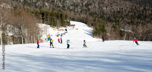 Skiers on high mountain photo