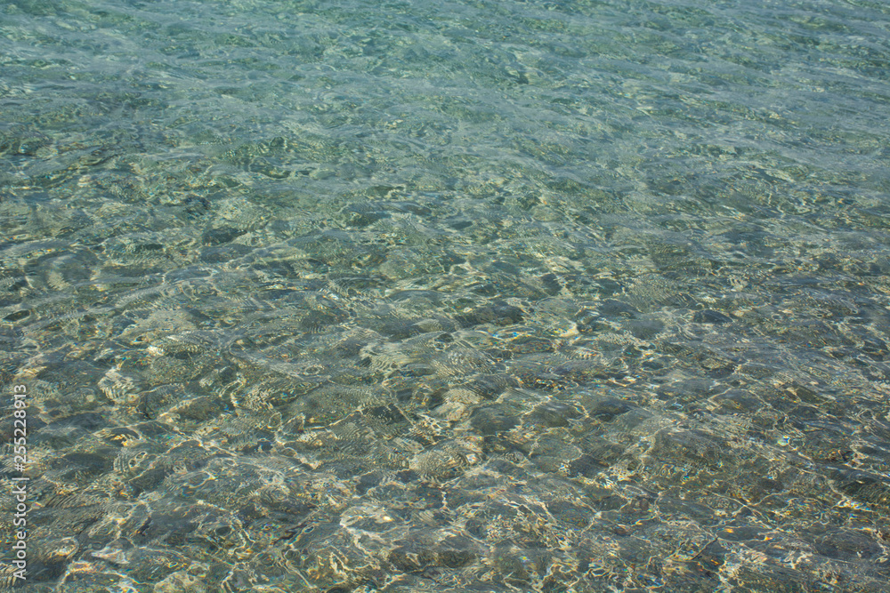 Shining blue sea water ripple background. Falasarna beach, Crete Island landmark
