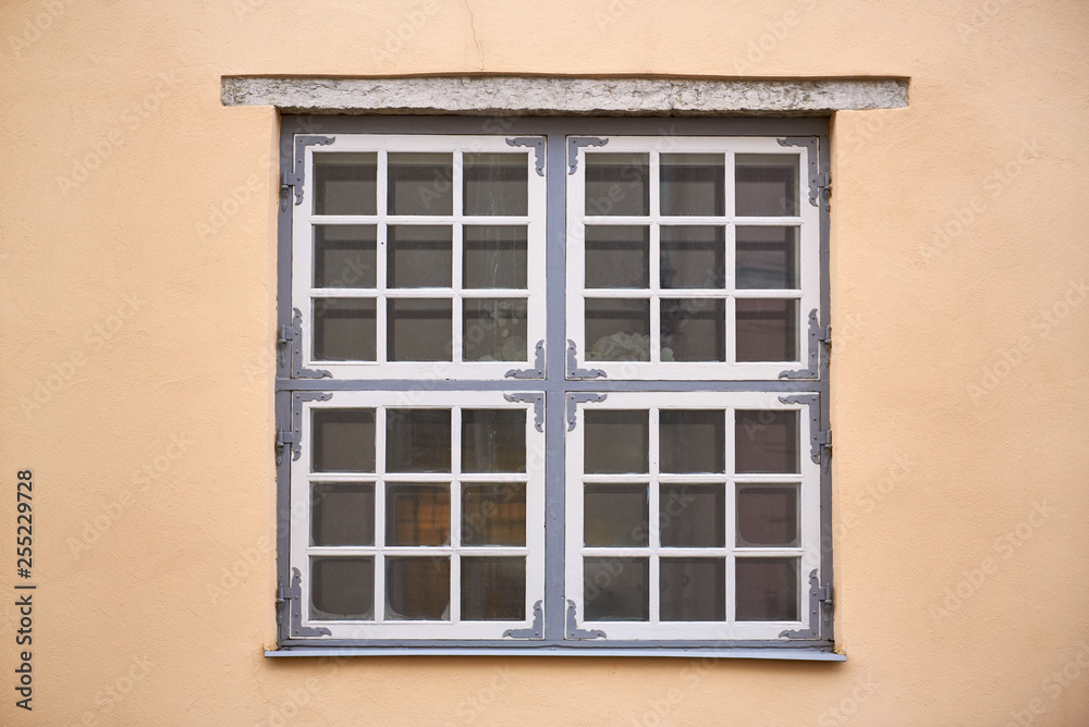 Old window on old wall.