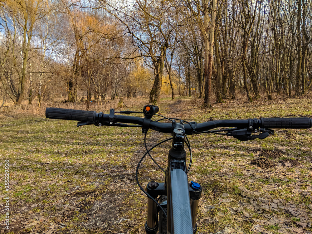 MTB bicycle on the trail in the spring season MTB bicycle on the trail in the spring season