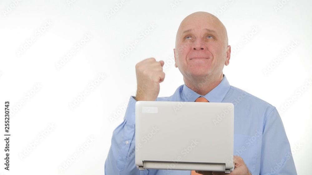 Happy Businessman Read Good News on Laptop and Make Victory Hand Gestures Happy Businessman Read Good News on Laptop and Make Victory Hand Gestures