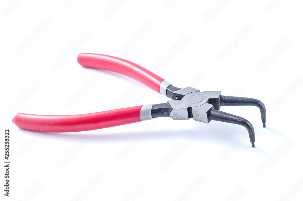 Circlip pliers with red handles on white background Circlip pliers with red handles on white background