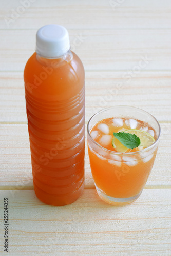 Iced tea with mint leaves photo