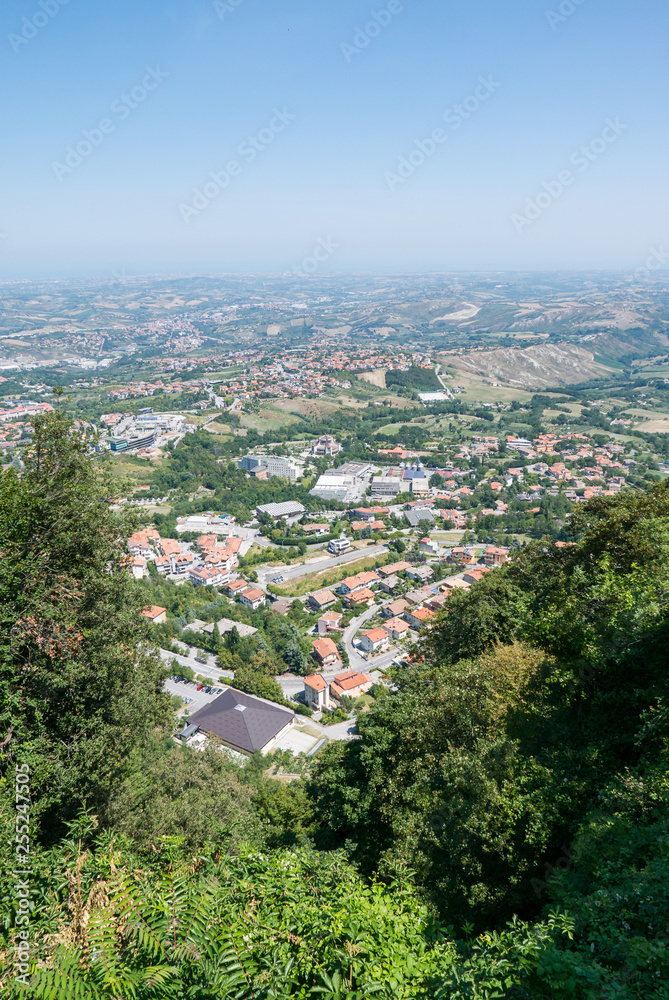 Panoramic view of the valleys surrounding San Marino, a small independent country surrounded by Italian territory. Panoramic view of the valleys surrounding San Marino, a small independent country surrounded by Italian territory.