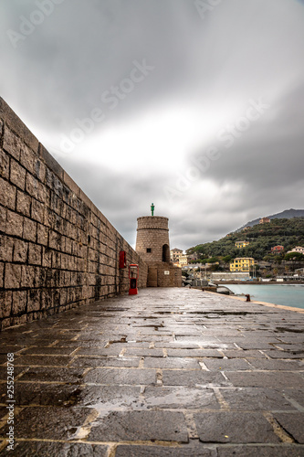 View of the watchtower over the sea in the town of Recco, Genoa. © Master Of Footage