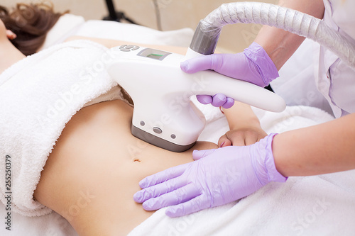 Bild auf Leinwand Body Care. Woman is in the process at the clinic lipomassage