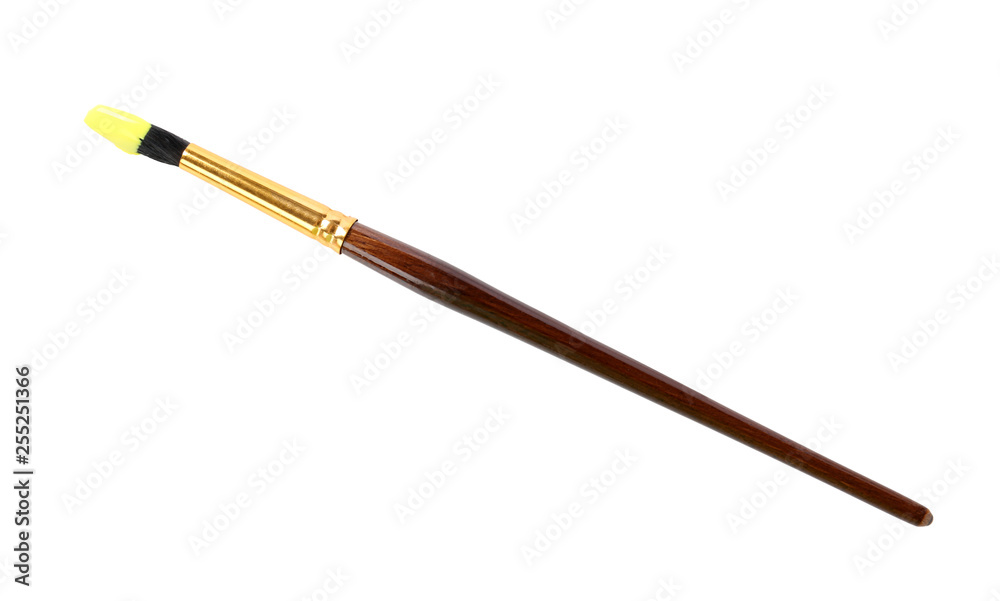 Brush with color paint on white background, top view Brush with color paint on white background, top view
