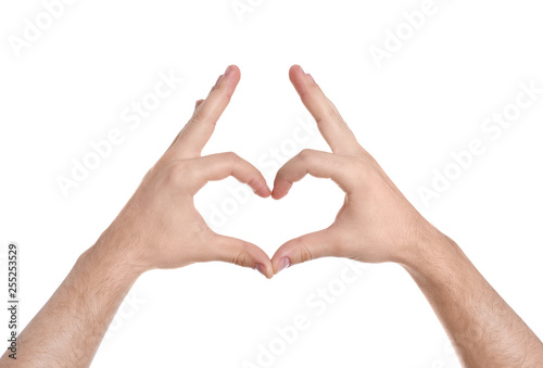 Man making heart with his hands on white background  closeup