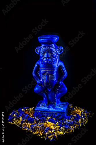 bes statue, the god of fertility in ancient egypt