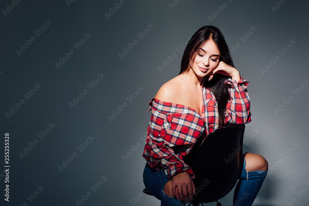 Portrait of beautiful brunette woman with natural make-up, on grey background. Portrait of beautiful brunette woman with natural make-up, on grey background.