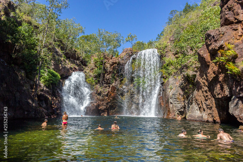 Tourists and residents enjoy refreshing swim at Florence Falls  very popular desitination for tourists and locals alike  Litchfield National Park  Northern Territory  Australia
