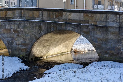 bridge in Bayreuth in backlit with snow
