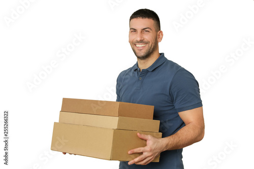 Young man holding cardboard boxes