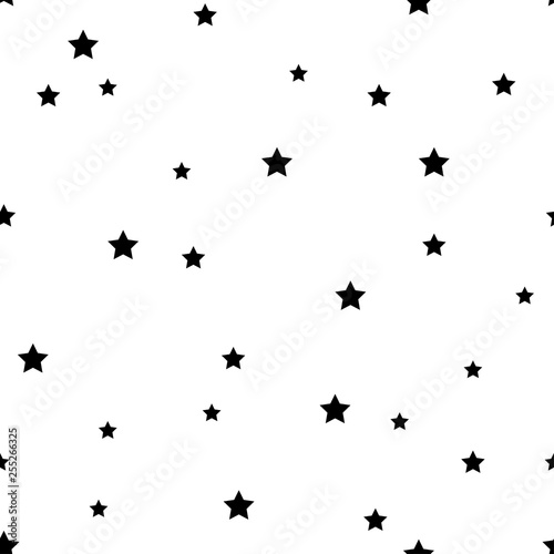 The seamless pattern with black stars on a white background. Vector. © aisedora