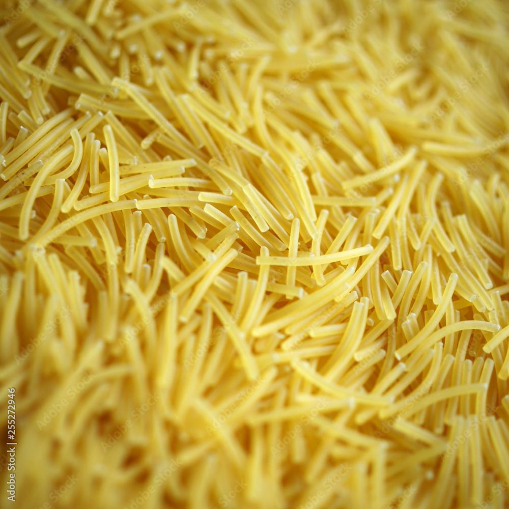 Vermicelli background yellow, texture pasta Vermicelli background yellow, texture pasta