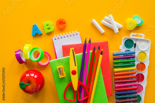 Stationery yellow background. Education. Training material for learning and creativity.