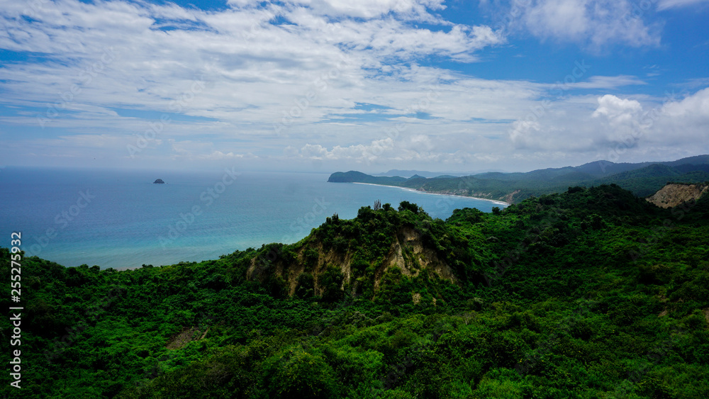 Fototapeta premium Road Trip in Ecuador Exploring the Coast from Guayaquil to Montanitas while enjoying the Forest and Green Waters of the Pacific Ocean.