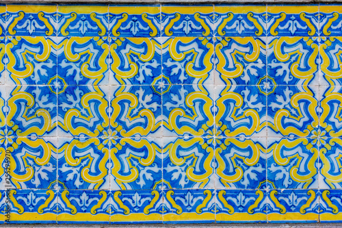 Ornate brightly colored portugese tile texture in blue and yellow
