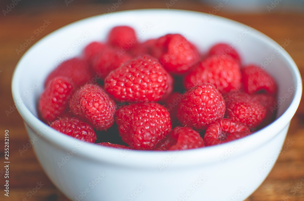 raspberries in a bowl raspberries in a bowl
