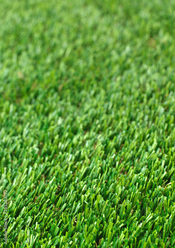 Vertical natured green grass golf field paper background Vertical natured green grass golf field paper background
